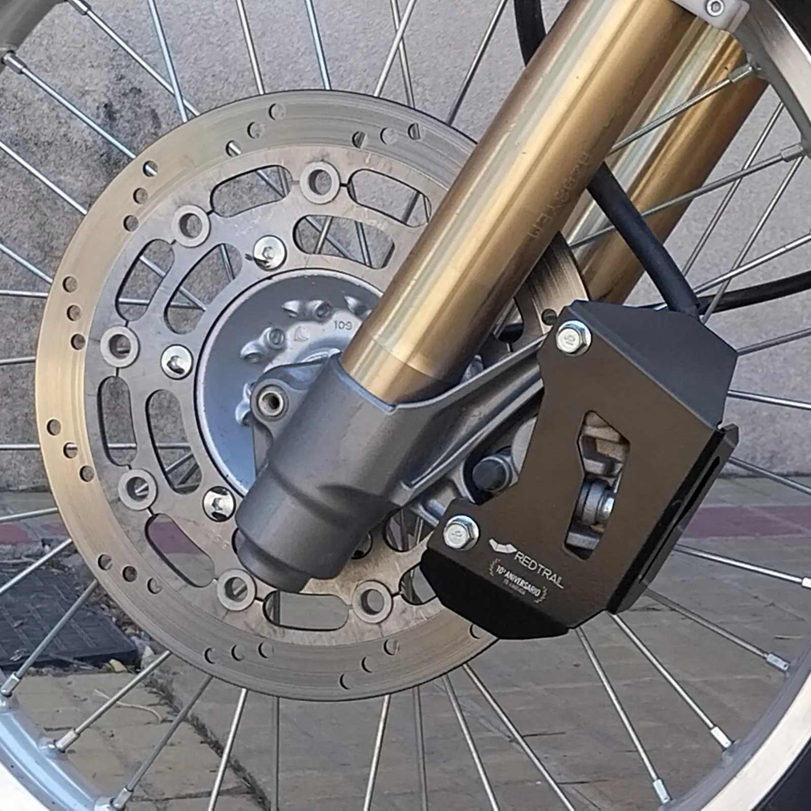 Protector Caliper Delantero